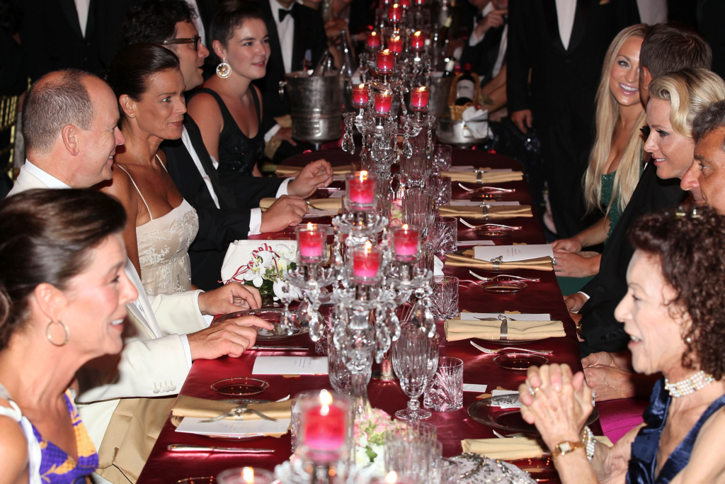 Elegant dinner party with guests enjoying conversation.