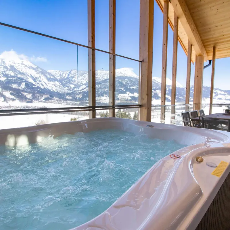 Mountain view from wooden deck with jacuzzi