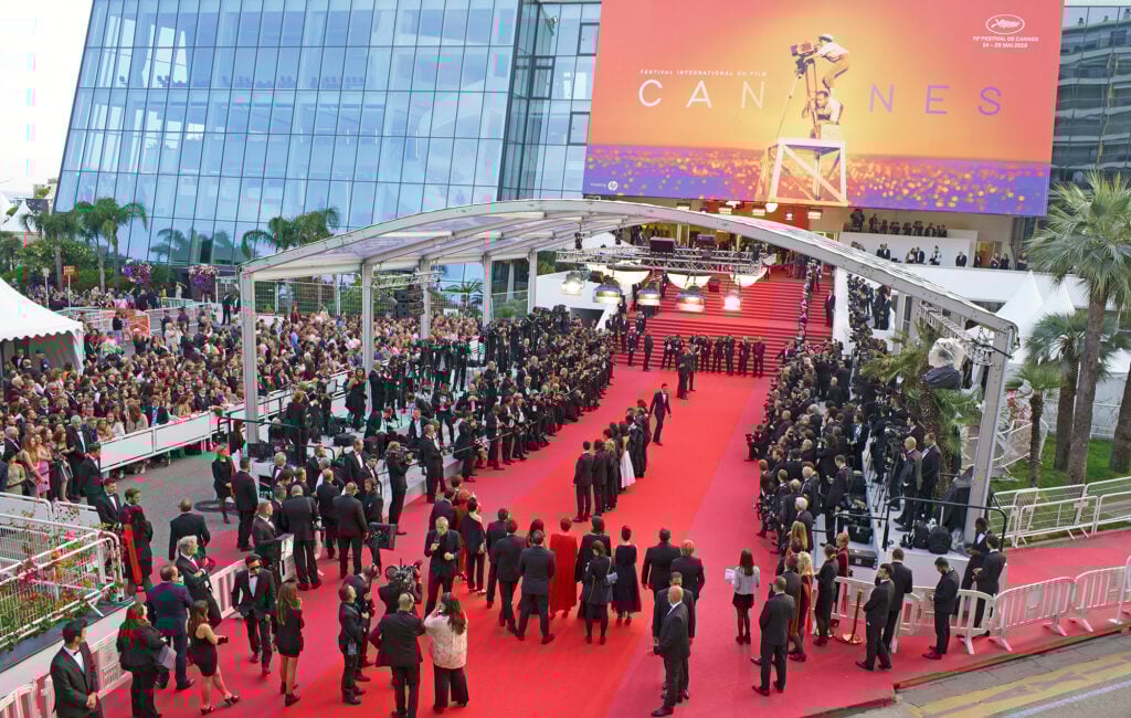 Cannes Film Festival red carpet event with crowd.