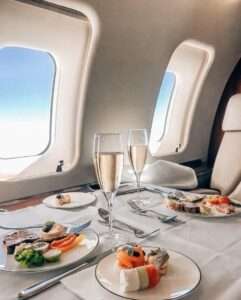 Luxury dining setup inside a private jet.