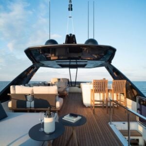 Luxury yacht deck with seating, ocean view