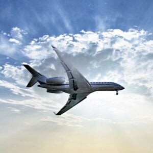Jet airplane flying against a cloudy sky