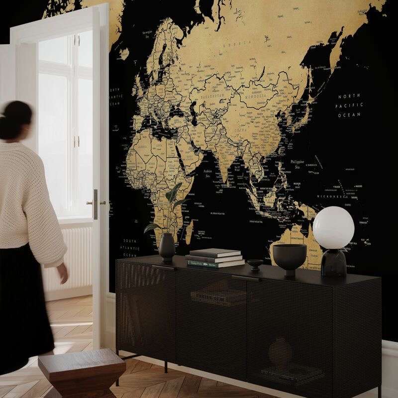 Modern room with large world map wall art.