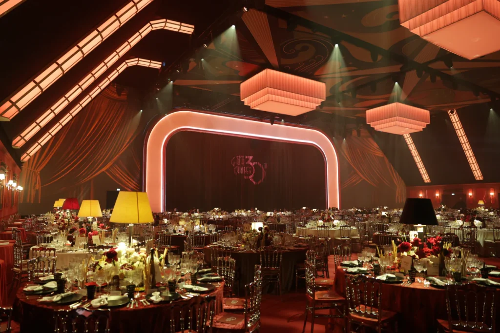 Luxurious gala dinner with elegant table settings.