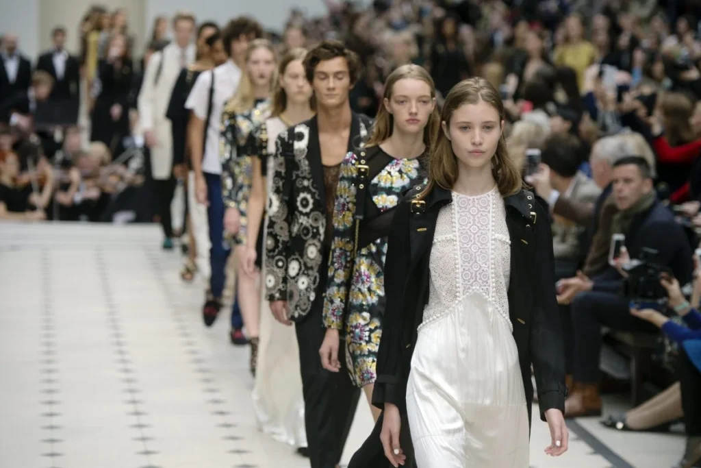 Fashion models walking runway in stylish outfits