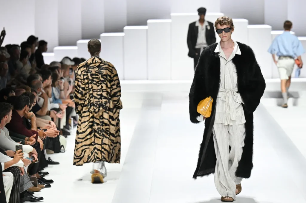 Models walking in high fashion runway show