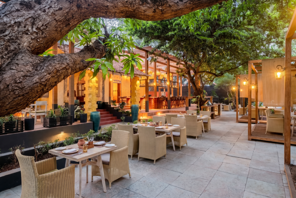 Elegant outdoor restaurant patio with warm lighting