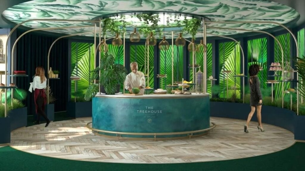 Modern green-themed cafe interior with tropical plants.