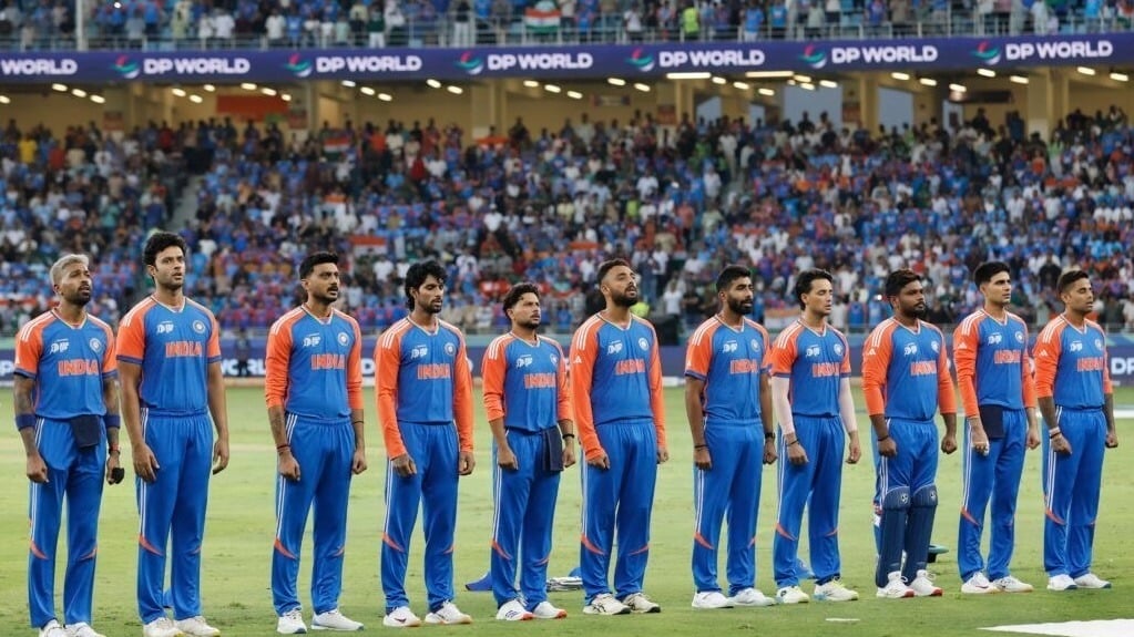 Indian cricket team standing on field