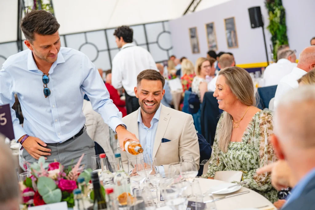 People enjoying drinks at a celebratory event