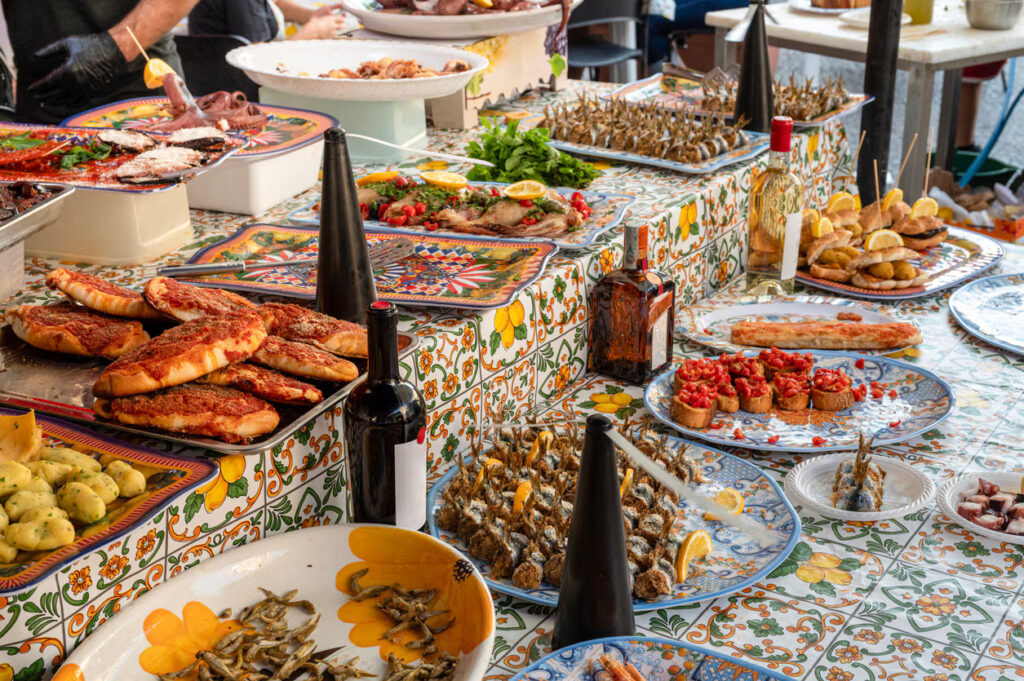 Colorful seafood buffet on patterned tiled table
